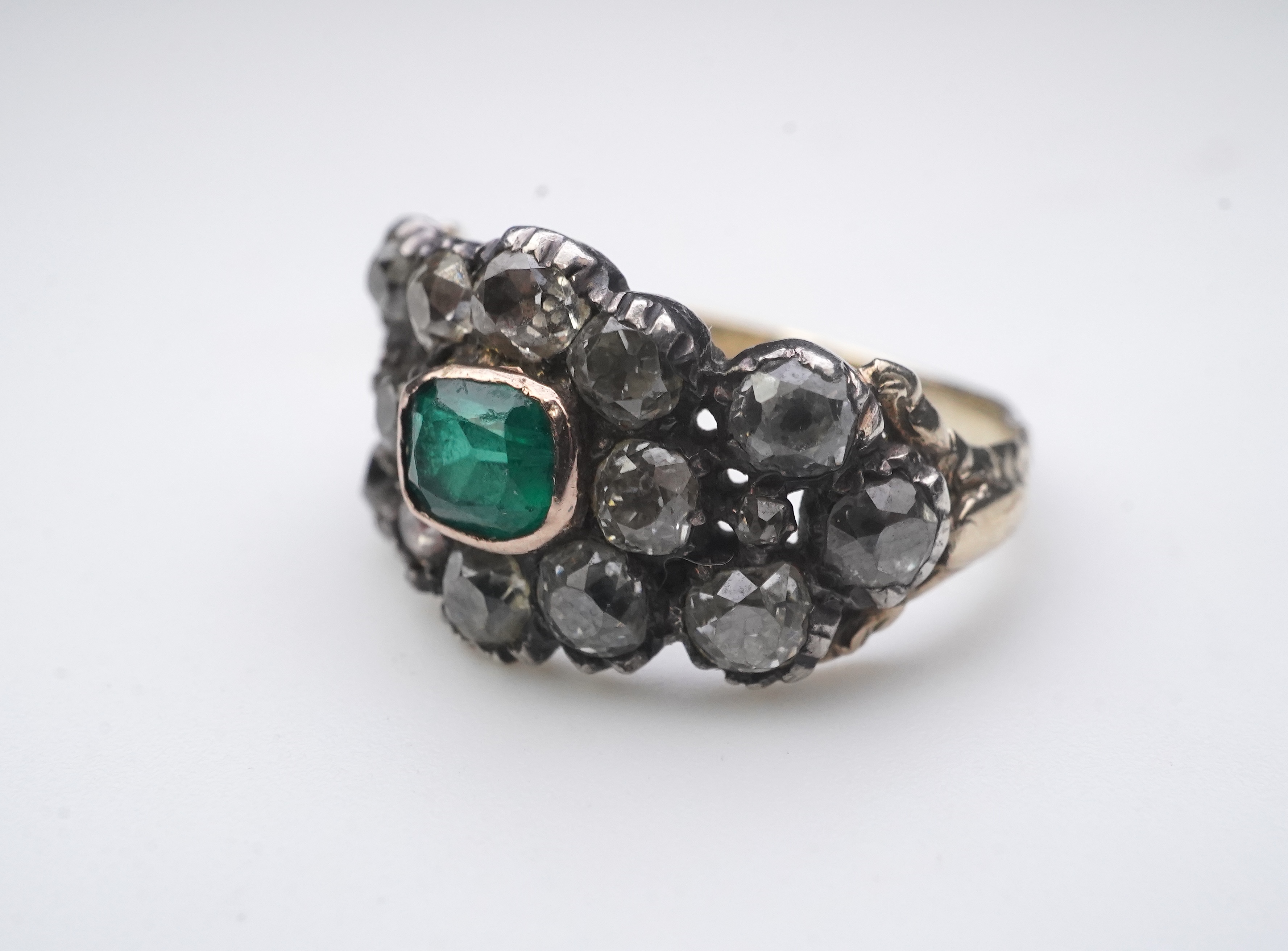 A Georgian diamond and simulant emerald ring, circa 1800